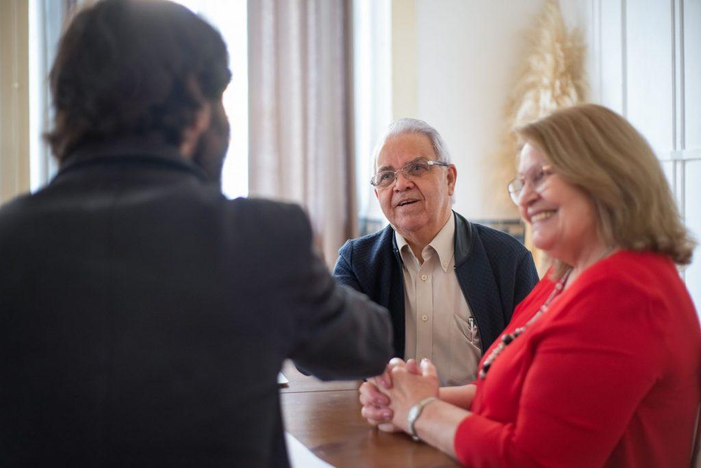 Couple meeting a licensed immigration consultant about a humanitarian and compassionate application